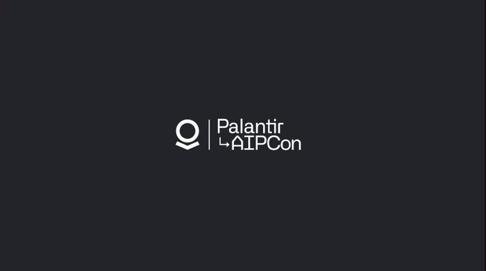 A presenter speaking on stage at Palantir's AIPCon.