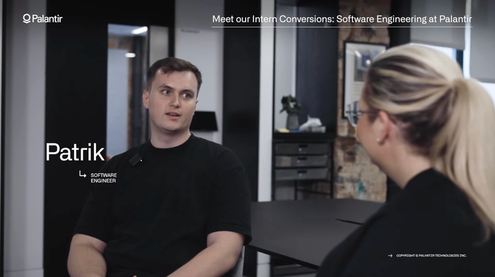 A Palantir employee sits for an interview. 